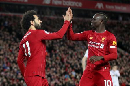 Liverpool extend unbeaten EPL run to a year with 2-0 win over Blades