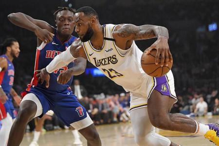 LA Lakers down Detroit Pistons with James&#039; triple-double, 20 blocks