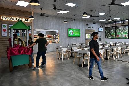 Competition heats up as GrabFood opens first shared kitchen here