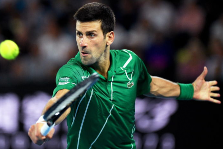 Djokovic sets up Federer showdown with Raonic rout