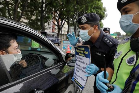 Malaysia reports record jump of 212 coronavirus cases 