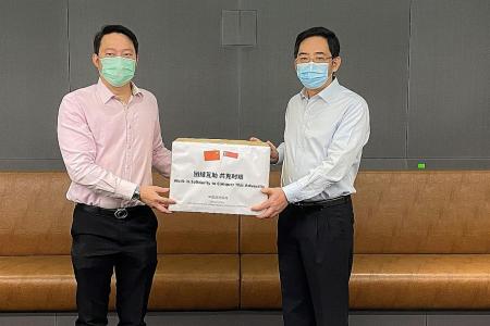 China donates 600,000 masks to Singapore