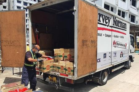 Harvey Norman delivers gift packs to over 1,000 migrant workers