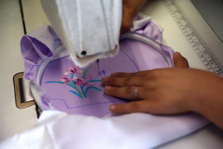 Protection in style: Chinese designer makes silk coronavirus masks