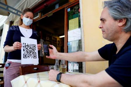 Italy eatery trades paper menus for scan codes amid Covid-19