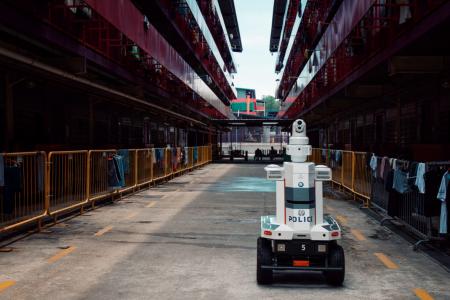 Police deploy robots to patrol workers&#039; dorms, ensure safe distancing 