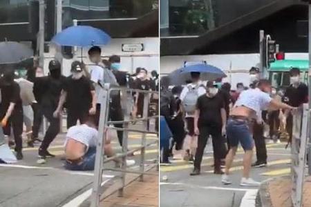 Video showing HK protesters beating up lawyer a blow to movement