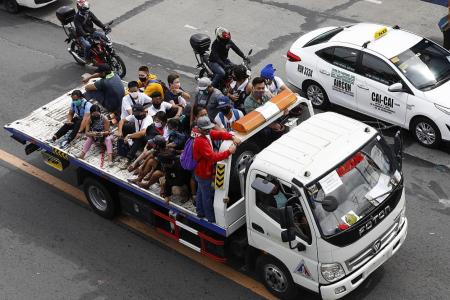 Manila emerges from one of world’s longest coronavirus lockdowns 