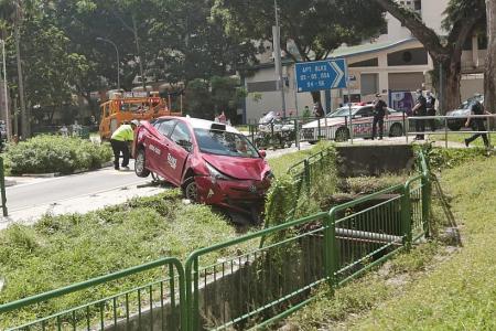 Cabby taken to hospital after his taxi lands in 3m-deep ditch