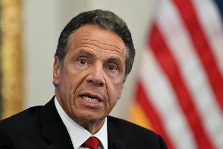 New York governor threatens to roll back phased reopening
