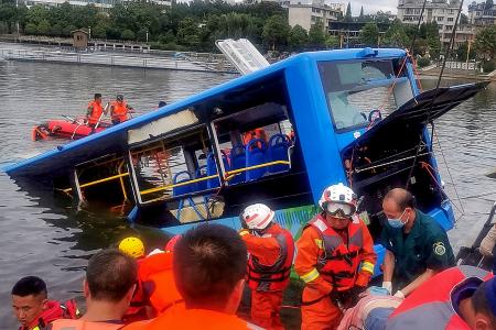 21 dead after bus plunges into lake in south-western China
