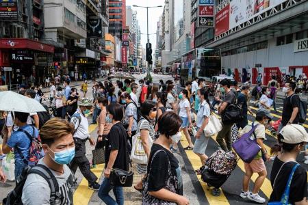 HK reports 73 new cases as health experts call for tougher measures