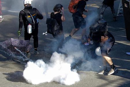 Seattle Black Lives Matter clashes spark arrests, policemen injured
