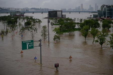 South Korea battles both virus and floods