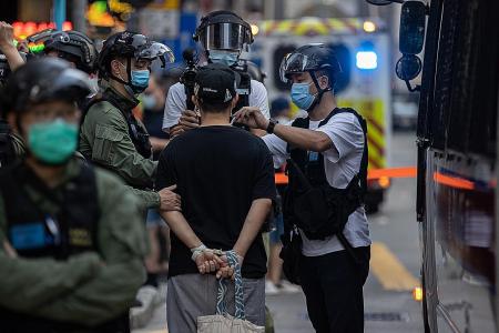 Hong Kong police fire pepper balls at protesters, 90 arrested
