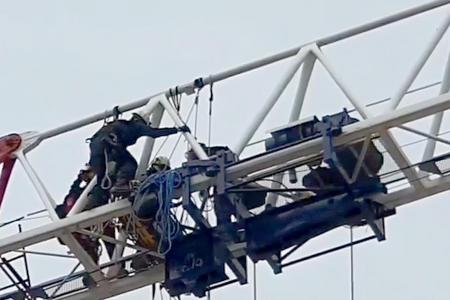 Injured worker rescued from 40m-tall crane