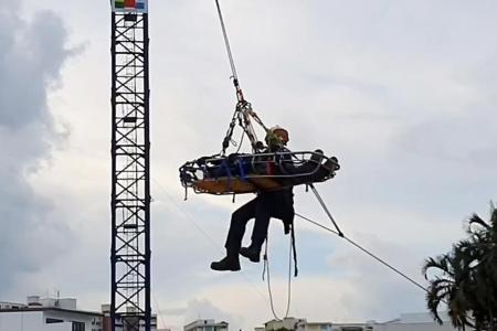 Treating injured worker dangling 40m in the air