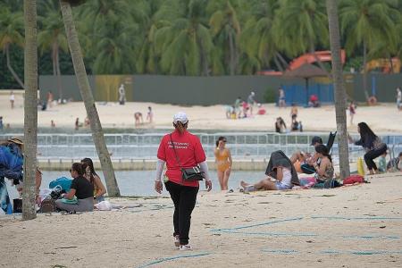 Crowds hit Sentosa beaches ahead of new rule