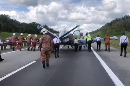 Singapore pilots forced to land plane on expressway in Johor