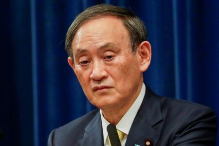 PM criticised for attending year-end dinners in coronavirus-hit Japan