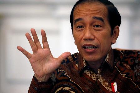 Under-fire health minister dropped in Indonesian Cabinet reshuffle