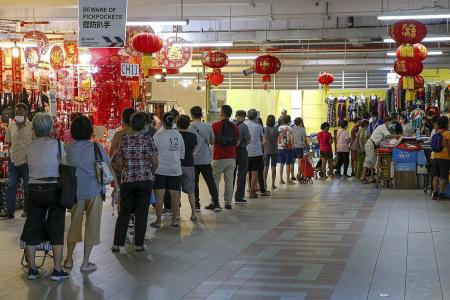 Chinatown market less packed as safe management measures stepped up
