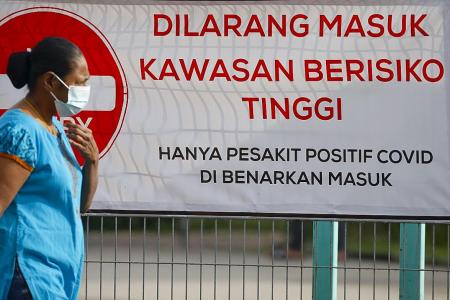 Malaysia gets tough to make sure people comply with coronavirus curbs