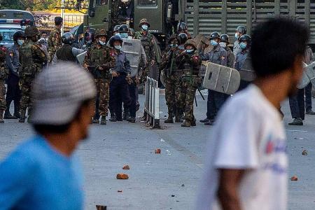 Myanmar security forces open fire on protesters in Mandalay