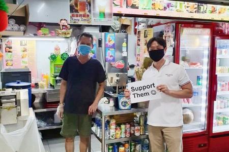 MP Louis Ng probed for holding sign supporting hawkers without permit