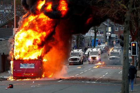 Bus torched in Belfast bedlam