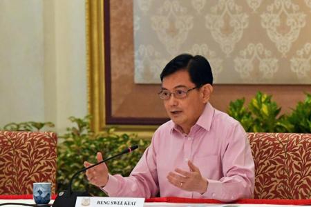 DPM Heng steps aside as 4G leader for younger successor 