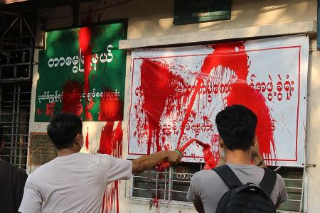 Myanmar activists stage &#039;bloody&#039; protests against military