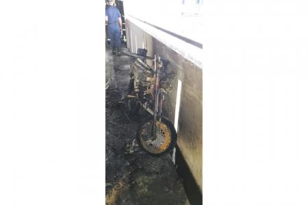 Two stranded on ledge after Bedok flat catches fire