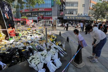 China police nab suspect in street knife attack that killed six 