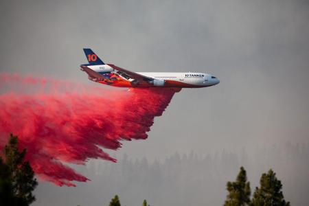 US firemen fighting wildfire spanning an area larger than Los Angeles