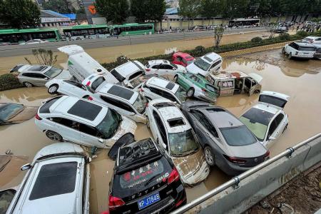 Chinese in shock as subway floods after heaviest rains in 1,000 years
