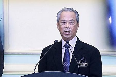 Malaysia PM defies pressure to quit, says he has majority support