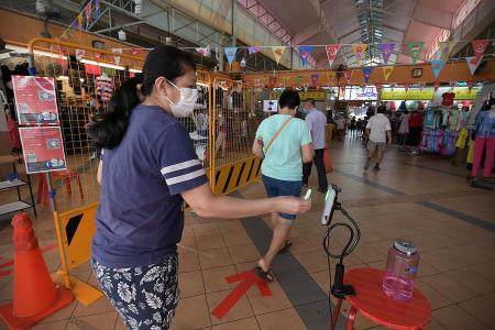 Stallholders lament thin crowds as Chong Pang Market reopens
