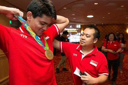 Ex-spokesman for Joseph Schooling charged with 21 counts of cheating