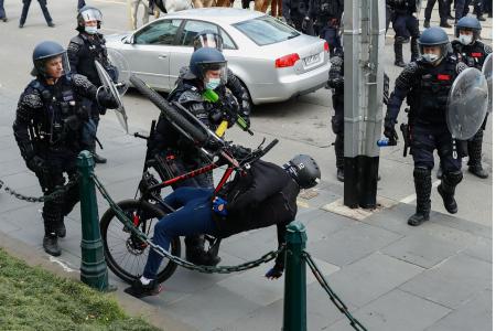 Melbourne police fire pepper balls, pellets to break up Covid protest