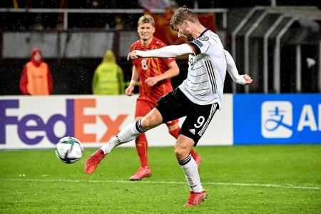 Germans World Cup-bound, but cautious