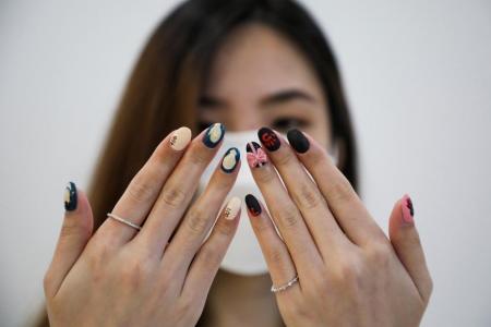 Malaysian nail salon paints Squid Game manicures