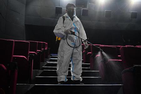 Cinemas, gyms in Manila to reopen in bid to boost jobs