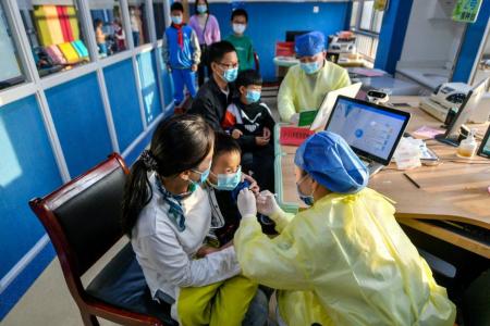 China reports nearly 250 local Covid cases in latest outbreak
