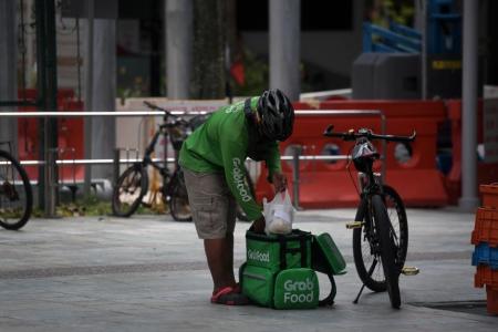 Couple kicked and punched Grab Food deliveryman; woman, 33, jailed