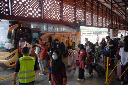 Singaporeans head to Johor on expanded land VTL to reunite with families