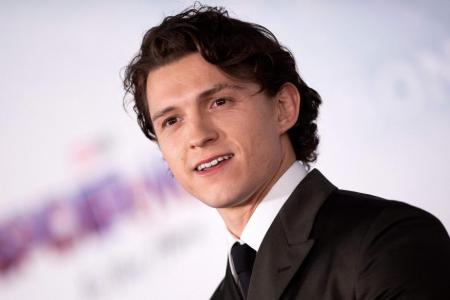 Tom Holland keeps promise to boy who saved sister from dog attack