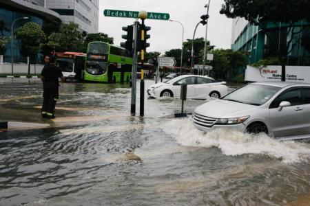 What should motorists and residents do in case of a flash flood?
