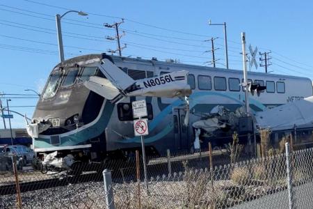 Plane hit by train after crashing on train tracks in California