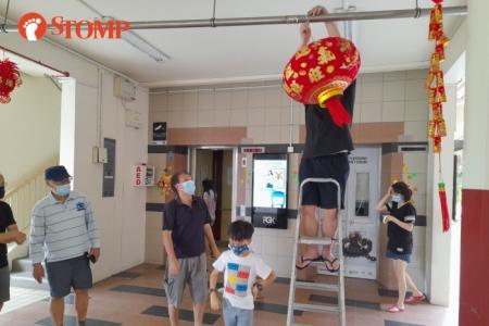 Neighbours band together to decorate Bishan block for Chinese New Year